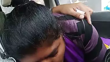 Telugu woman gives a desi blowjob to her man in a car